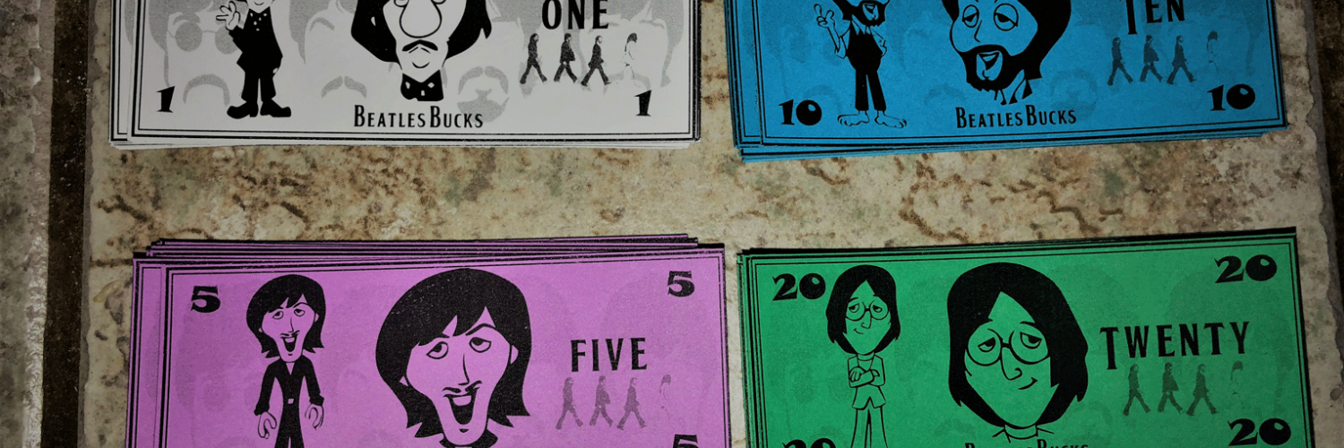 Beatle Bucks with John on the $20, Paul on the $10, George on the $5, and Ringo on the $1